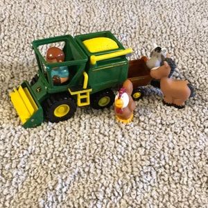 John Deere Combine with Animals